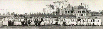 A group of people in white dresses and hats

Description automatically generated