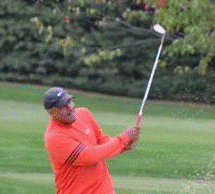 Pat Pierson hits out of a bunker on the 14th hole at Rockrimmon Country Club on Wednesday during the final round of the WGA Mid-Am Championship. The 50-year-old Nyack resident closed with a 2-over 74 and won by a stroke.